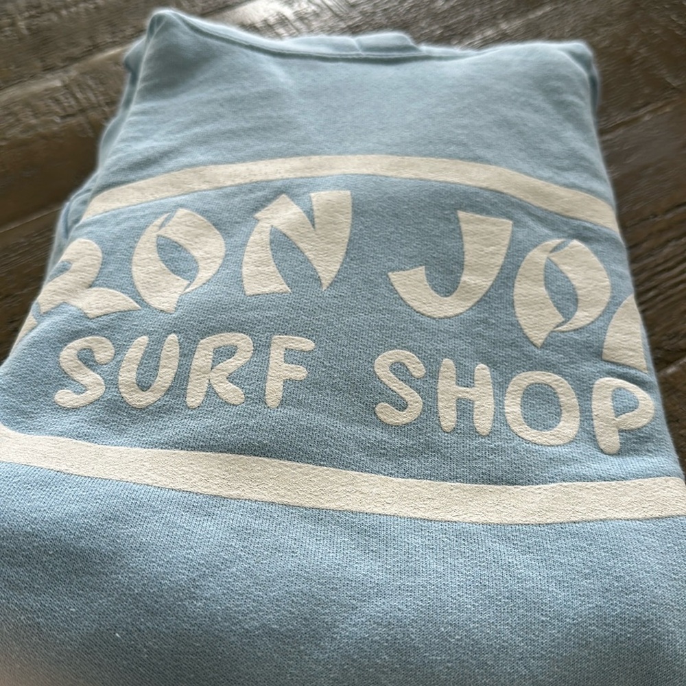 RonJon surf shop light blue hooded sweatshirt. Adult small. Like new